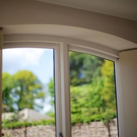 curved top wooden windows